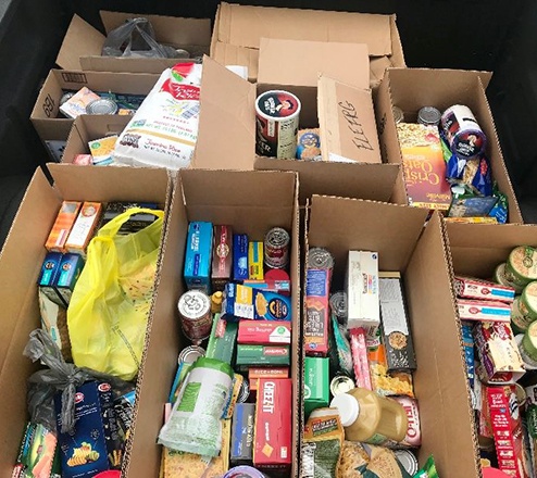 Food collected by Wells team members for community members in need