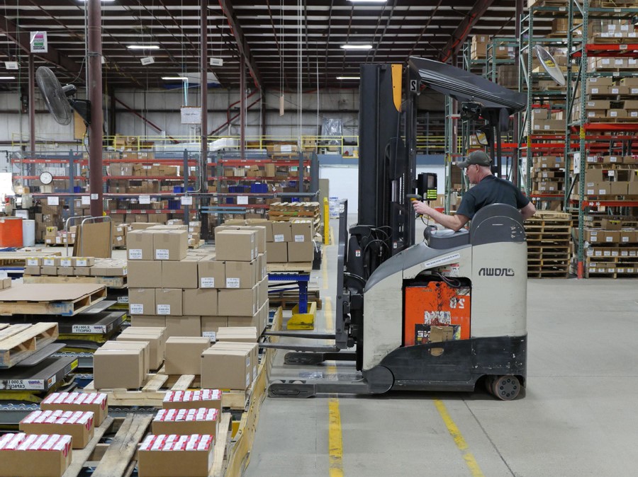 Man driving forklift in Wells VE facility